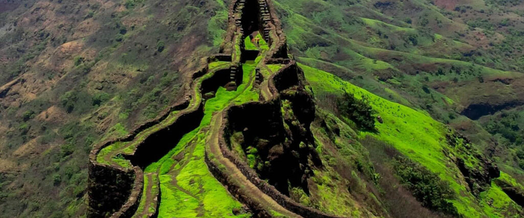 Torna Fort covered in clouds – scenic trekking place near Pune during monsoon